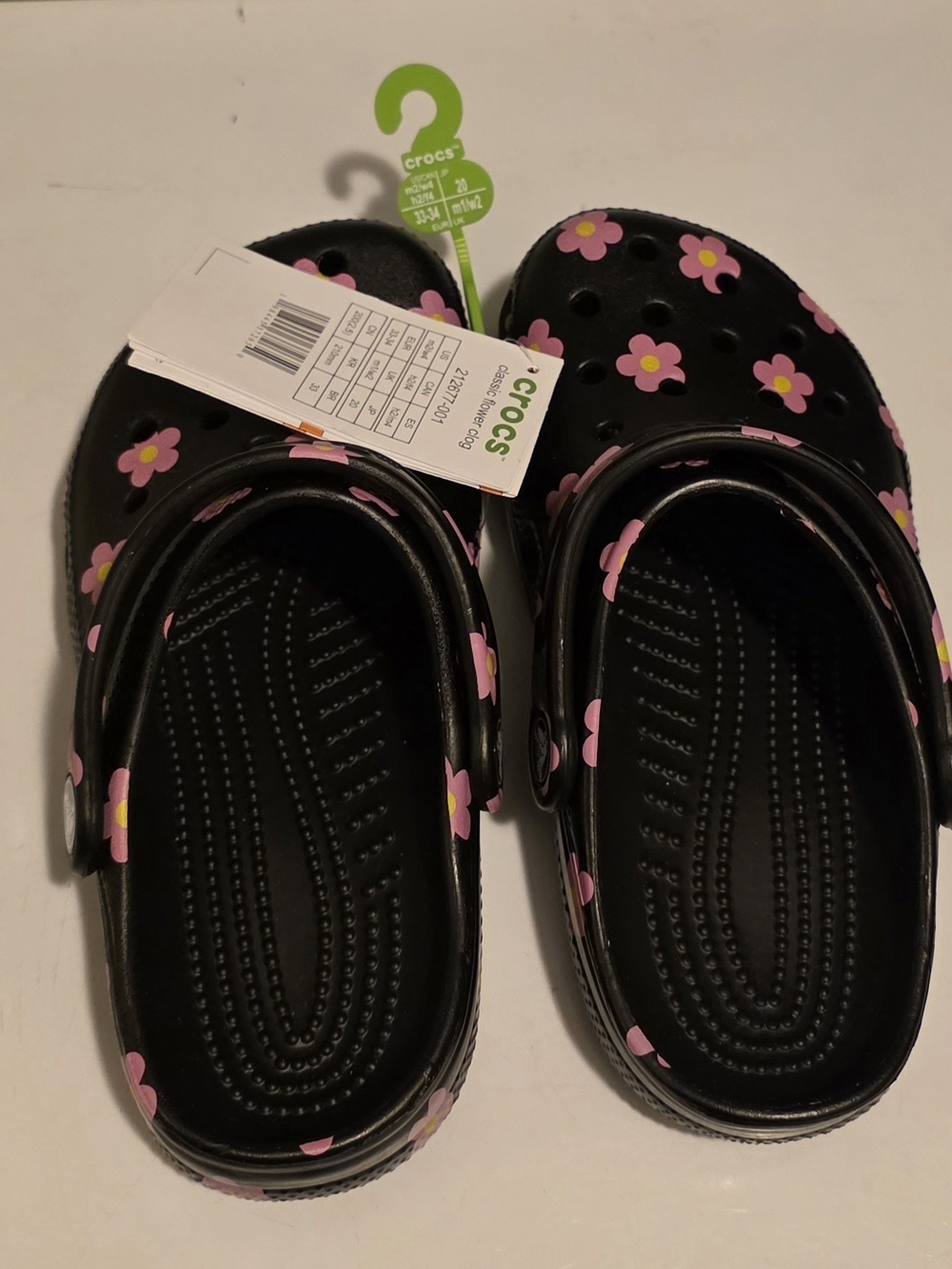 CROCS Kids Black Clog with Pink Flower Accents